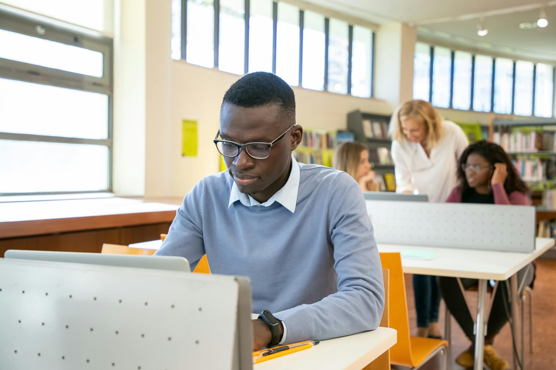 Learner working on a laptop during accredited training